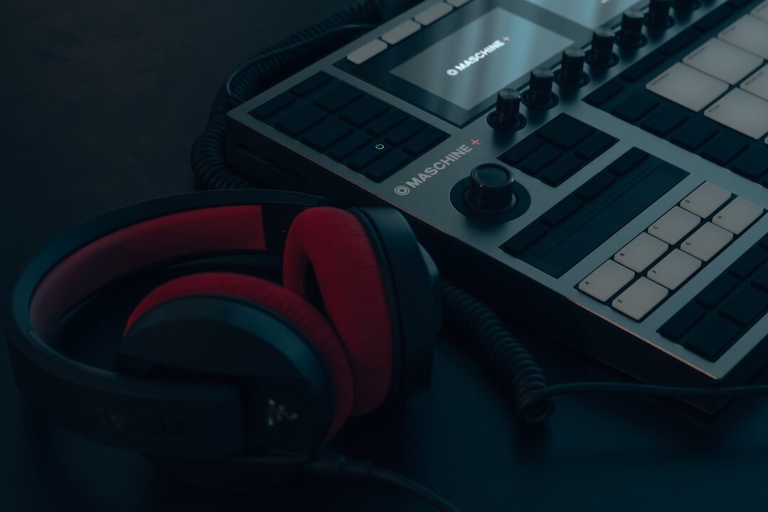 Audio mixing console with headphones in a sound studio