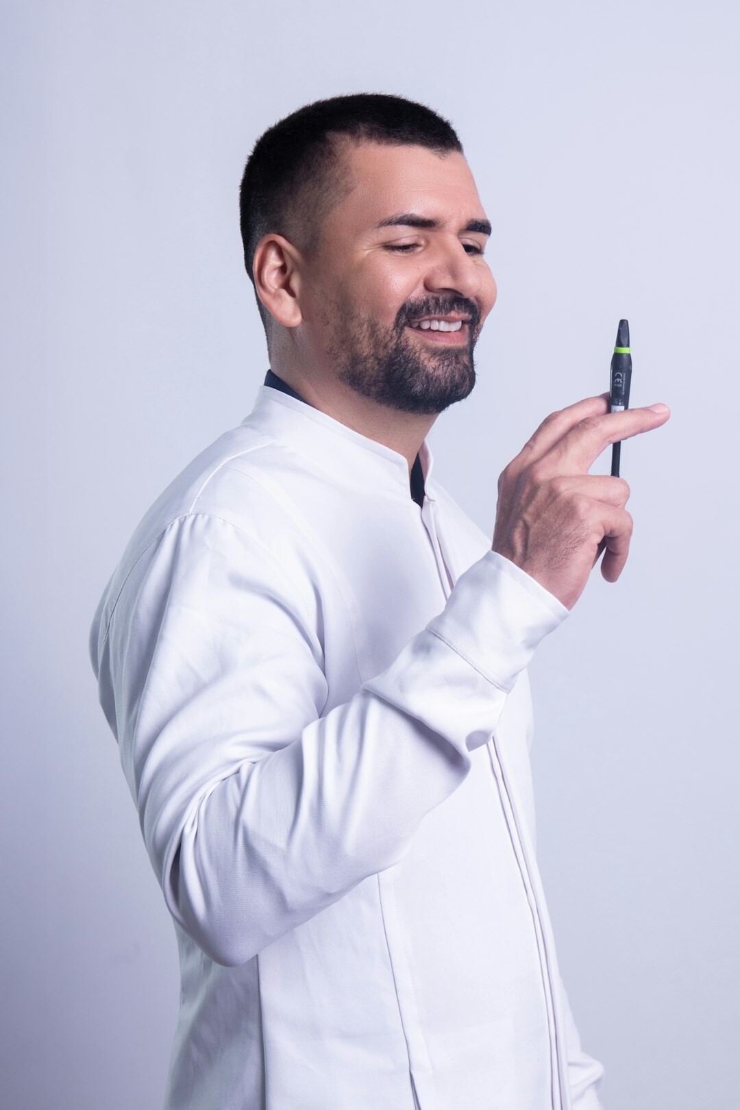 Studio portrait of a middle aged Turkish man presenter